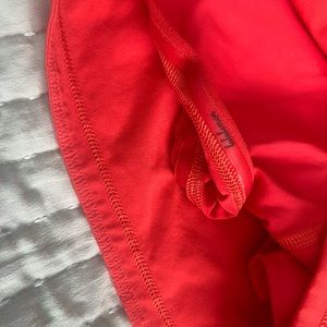Lulu Lemmon orange tennis skort